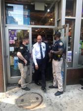 <b>Sheriff Anthony Miranda leaves the New City Smoke Shop on May 7. The store was padlocked on day one of the city wide crackdown.</b> Photo: Keith J. Kelly