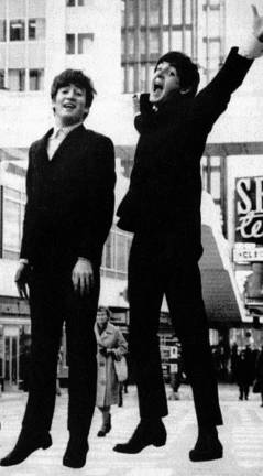 Prior to Dec. 8, 1980, legions of Beatles fan had always hoped Paul McCartney (right) and John Lennon (left), seen here in Stockholm in 1963, would reunite with Ringo Starr and George Harrison. Photo: Wikimedia Commons