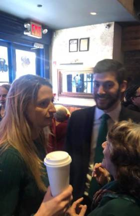 <b>Virginia Maloney (left) the daughter of former Congress woman Carolyn Maloney, has been coming to the pre-parade breakfast tossed by the Lexington Democratic Club since she was a baby, her mother informed the gathering. Now Virginia is co-hosting the annual event along with Assembly member Alex Bores (center)</b> Photo: Keith J. Kelly