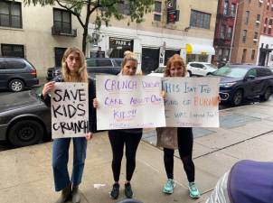 Amanda Petersen, Jessica Thigpen and Margaux Gray (l to r) protested the Crunch Fitness decision in front of the West 83rd St. gym on Oct. 29th.