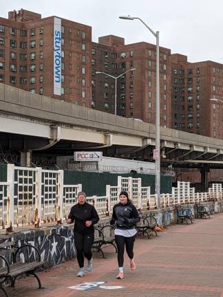 <b>Runners and bikers now have a path from about 34th St. to the Williamsburg Bridge, a distance of about two miles in an area that has largely been blocked off for the past two years.</b> Photo: Brian Berger
