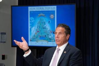 Last summer Governor Andrew M. Cuomo created a poster to depict the “mountain” of New York’s COVID experience. Photo: Don Pollard / Office of Andrew M. Cuomo