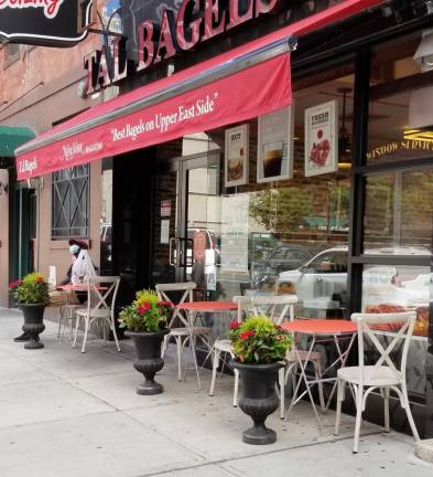 Sidewalk tables at Tal Bagels on East 86th Street. (Photo: Nancy Ploeger)