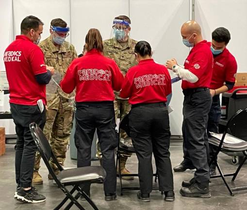 Paradocs EMTs with members of the New York National Guard at the Javits Center vaccination site. Photo courtesy of Paradocs