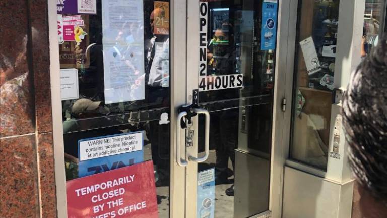 The New City Smoke Shop at 110 Church St. in downtown Manhattan was one of 75 stores that a law enforcement task force shut down for selling cannabis products without a proper license. The store sits one block away from St. Peter’s Church. Illegal shops near schools and churches are top targets in the crackdown. Photo: Keith J. Kelly