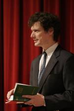 An undated photo of Stuart H. Johnson III, the outgoing headmaster of St. Bernard's School on the Upper East Side, in a familiar pose – with a book in his hands.