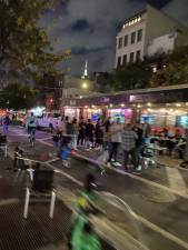 Nighttime outdoor dining scene at Shaffer’s on Eighth Ave. and 18th Street. Photo: Zoey Lyttle