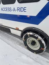 An Access-A-Ride vehicle bearing snow tires. An 88 year-old woman was killed by one of the MTA vans–used to transport disabled people &amp; operated by private contractors–in Chinatown on Friday, September 8.