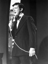 Photo of Bobby Darin performing. Darin’s own television show began when he hosted a summer replacement program for “<i>The Dean Martin Show</i>.”