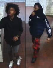 An NYPD photo depicting two suspects. Since they are minors, they remain unidentified. One is still at large.