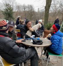 Human regulars gather with their pets.