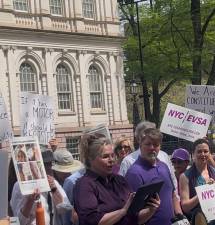 Janet Schroeder, who leads the Electric Vehicle Safety Alliance, rallied outside City Hall on April 16 for the passage of Priscilla’s Law. It would force the registration of e-bikes and other e-vehicles.