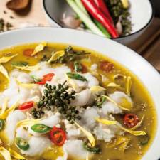 The signature Nai Brother soup at Nai Brother Sauerkraut Fish, 2817 Broadway.