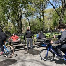 A man in Washington Square Park was almost knocked over by bicyclists who rode past. Photo: Shantila Lee