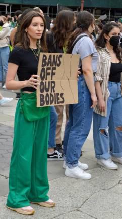 Protesters wear green to symbolize their support of safe, legal abortion. Photo: Abigail Gruskin