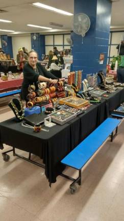 Carolyn Atlas Ochs with the jewelry she sells at her indoor Grand Bazaar location in the cafeteria at PS 77. Photo courtesy of Carolyn Atlas Ochs