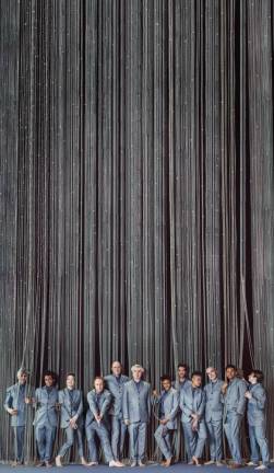 The American Utopia band stands in a line in the Hudson Theatre before the pandemic. Photo: Byran Derballa: