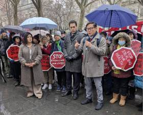 State Sen. Ron KIm speaks with Christopher Marte and State Sen. Jessica Ramos (left) on Feb. 18, 2026.