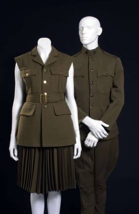 At left, Comme des Garcons (Rei Kawakubo), ensemble, 1998, wool, Japan, museum purchase; At right, U.S. Army World War I Service Uniform, 1914-1918, wool, USA, gift of Mrs. Roswell Gilpatric.