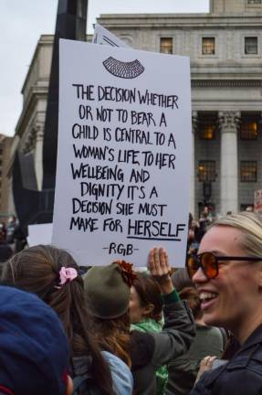 Many signs referenced the late Supreme Court Justice Ruth Bader Ginsburg. Photo: Abigail Gruskin