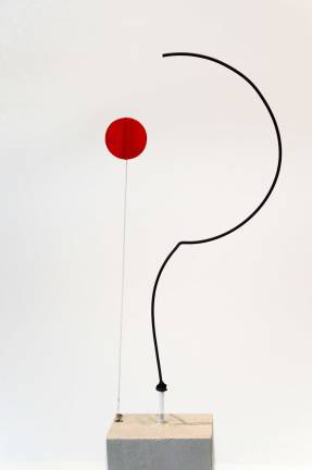 Alexander Calder's &quot;Half-circle, Quarter-circle, and Sphere,&quot; 1932, Sheet metal, wood and paint, with motor, 76 5/8 &#xd7; 35 1/2 &#xd7; 25 in. Whitney Museum of American Art. Photo: Adel Gorgy