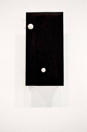 Calder's &quot;Two Spheres,&quot; 1931, a mechanized sculpture of wood, wire and paint, with motor (21 1/2 &#xd7; 11 in.). is being activated for the first time in decades at the Whitney. Calder Foundation, New York; promised gift of Holton Rower. Photo: Adel Gorgy