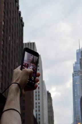 The crowd grew larger, even as the skies grew darker. Photo: Abigail Gruskin