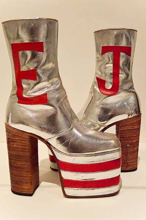 Elton John's silver lam&#xe9; monogrammed platform boots are part of MoMA's first exploration of fashion in over 70 years. Photo: Adel Gorgy