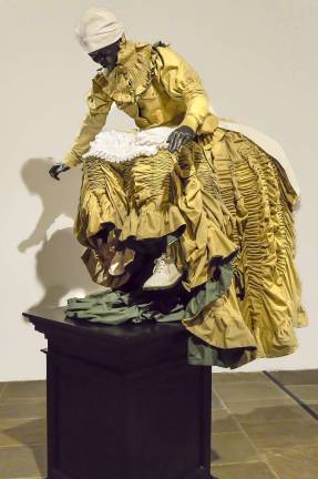 Mary Sibande's "Rubber Soul, Monument of Aspiration" from The Met Breuer's "Like Life." Sibande's work refers to the history of apartheid, said curator Sheena Wagstaff, but also to "the history of artists from that region ascending and taking over the plinth." Photo: Adel Gorgy
