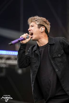 One Ok Rock’s Takahiro Moriuchi performing at Download Festival in Paris, France in 2016. Photo: mzagerp, via flickr
