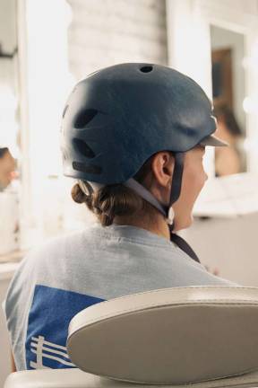 Cyclist Lucy Robson with the perfect helmet do. Photo: Ryan Segedi  