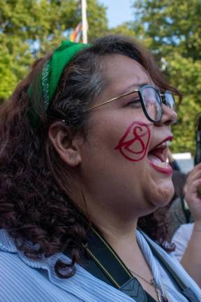 A protester in the crowd at Washington Square Park on June 24 takes part in group chants calling for change. Photo: Leah Foreman