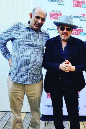 Jon Friedman with Elvis Costello at SummerStage, June 15, 2017. Photo: Emily Tan for SummerStage