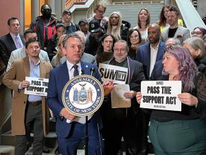 Chelsea City Councilmember Tony Simone rallying for the implementation of a bill that would mandate psychiatric care for some defendants departing jail, which is based on a report he issued in January.