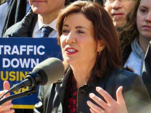 Governor Kathy Hochul, speaking at a Congestion Pricing Rally on March 21, has sent a letter to top Republicans in the Trump administration calling for the state to receive its “fair share” of federal mass transit funds. DOT Secretary Sean Duffy wants Hochul to turn off the congestion pricing cameras.