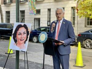 Council member Robert F. Holden speaking at Dorothy Kilgallen Way street co-naming.