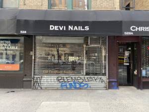 The shuttered storefront of Devi Nails on Amsterdam Avenue. Photo: Margaret Barnsley