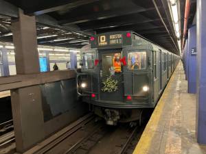 On every Saturday in December, the Subway Nostalgia Train will arrive and depart from the Second Avenue Station on the Lower East Side, starting at 10AM, bound for W. 145th Street, returning back to Second Avenue. Here is the NY Transit Museum’s R1-R9 train, with subway cars built between 1931-1938, arriving for its first trip of the day.