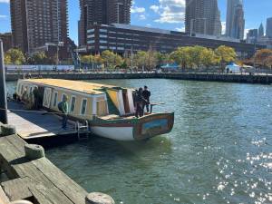 Visitors to Pier 26 in Tribeca check out the Seneca Chief replica on October 26. On the same date 200 years earlier, the original Seneca Queen completed its journey from the Buffalo through the brand new Eire Canal to Manhattan, marking a new era in the city as a thriving hub of commerce.