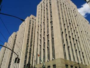 The suspect was being held at 100 Centre St. when he experienced a medical emergency and died.