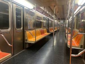 I took the #1 local train from the West 110th Street station to the World Trade Center station, and at no time were there more than six people in my car. After Houston Street (seen here), I was the only passenger in the car for about four local stops.