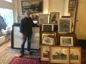 Book restorer Richard Rosenblatt at his corner of Argosy Book Store, where he has worked for 39 years while maintaining his career as a fine artist (and rock drummer).