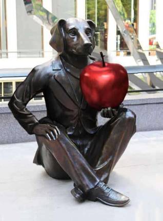 “He Thought This was Going to be a Year of Good Fortune,” a 900-pound 'dog-man' by the Australians Gillie and Marc Schattner, has provoked strong feelings in Chinatown. Photo: Community Board 3