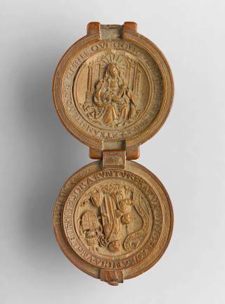 Adam Dircksz and Workshop, Prayer bead for the Carthusian François du Puy, ca. 1517-21, Boxwood, Diameter: 1 7/8 inches, Private collection. Photo: courtesy The Frick Collection