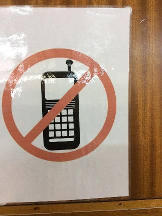 Cell phones are banned in all public schools in New York State as of the start of the current school year. In the city, the ban is drawing mostly positive reviews so far.