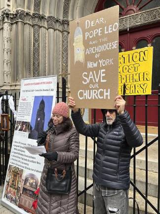Rally goers on Dec. 8 called on Pope Leo and the Archdiocese to save Most Holy Redeemer Church on East 3rd St.