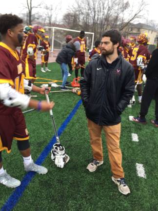 Harlem Lacrosse and FDA coach Owen Van Arsdale on the sidelines in the showdown with Monsignor Farrell High School. Photo: Stephan Russo
