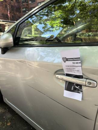 20th Precinct getting the stolen-wheels word out via crime-prevention flyers.