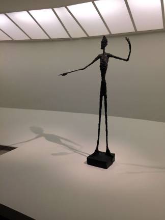 Keep walking: an edition of Alberto Giacometti's iconic bronze sculpture &quot;Man Pointing&quot; (1947) is at the Guggenheim, part of a nearly 200-item retrospective of the Swiss-born artist. Photo: Val Castronovo