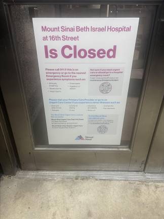 Sign at the front door of the once bustling front entrance to Mount Sinai Beth Israel Hospital which shut down on April 9.